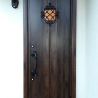 木製のランマ付き玄関ドアを、木目調ランマ無しのドアでリフォーム